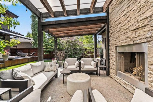 4115 15 Street Sw, Calgary, AB - Outdoor With Fireplace With Deck Patio Veranda With Exterior