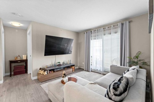 3407-11 Mahogany Row Se, Calgary, AB - Indoor Photo Showing Living Room