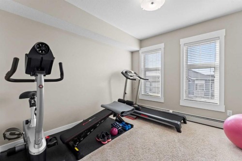 3407-11 Mahogany Row Se, Calgary, AB - Indoor Photo Showing Gym Room