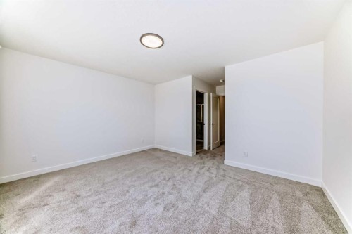 109 Heritage Park, Cochrane, AB - Indoor Photo Showing Other Room