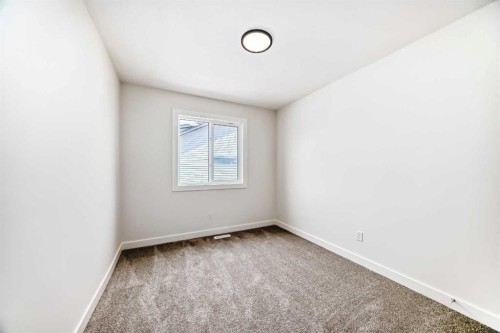 109 Heritage Park, Cochrane, AB - Indoor Photo Showing Other Room