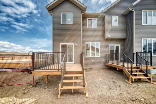 109 Heritage Park, Cochrane, AB - Outdoor With Deck Patio Veranda