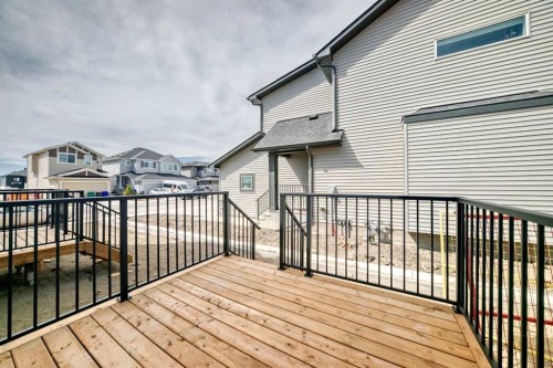 109 Heritage Park, Cochrane, AB - Outdoor With Deck Patio Veranda With Exterior