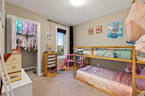 51 Legacy Close Se, Calgary, AB - Indoor Photo Showing Bedroom