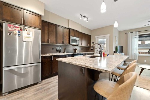 51 Legacy Close Se, Calgary, AB - Indoor Photo Showing Kitchen With Stainless Steel Kitchen With Upgraded Kitchen