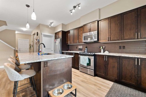 51 Legacy Close Se, Calgary, AB - Indoor Photo Showing Kitchen With Upgraded Kitchen
