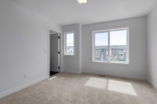 74 Agate Road, Cochrane, AB - Indoor Photo Showing Other Room