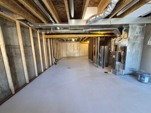 74 Agate Road, Cochrane, AB - Indoor Photo Showing Basement
