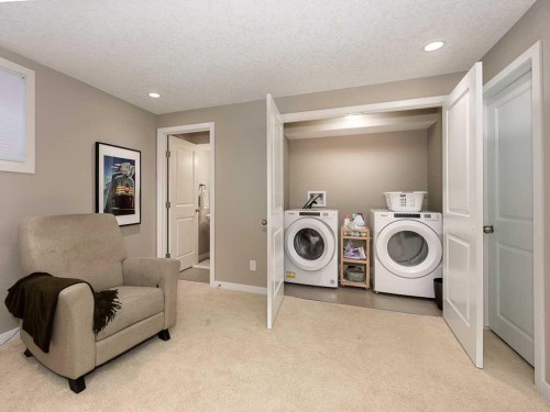 14 Walden Road Se, Calgary, AB - Indoor Photo Showing Laundry Room