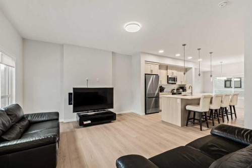 611-20295 Seton Way Se, Calgary, AB - Indoor Photo Showing Living Room