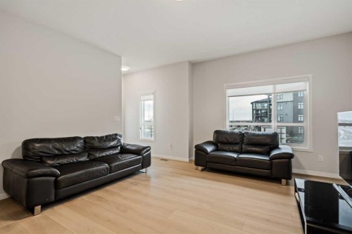 611-20295 Seton Way Se, Calgary, AB - Indoor Photo Showing Living Room