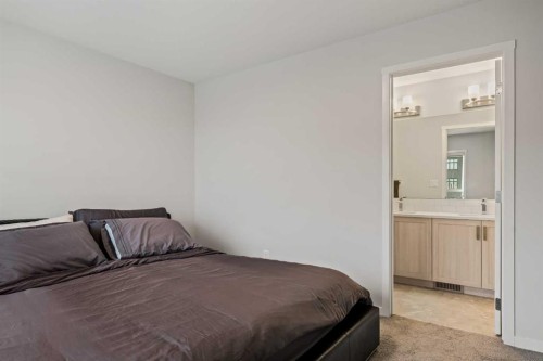 611-20295 Seton Way Se, Calgary, AB - Indoor Photo Showing Bedroom
