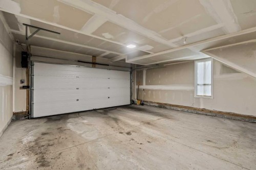 611-20295 Seton Way Se, Calgary, AB - Indoor Photo Showing Garage