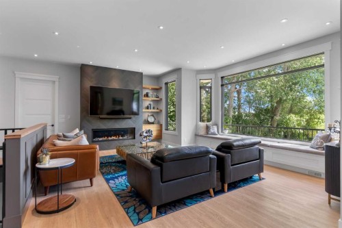 732 West Chestermere Drive, Chestermere, AB - Indoor Photo Showing Living Room With Fireplace