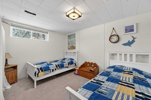 235 Allan Crescent Se, Calgary, AB - Indoor Photo Showing Bedroom