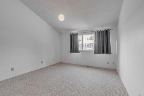 9-2225 Oakmoor Drive Sw, Calgary, AB - Indoor Photo Showing Other Room