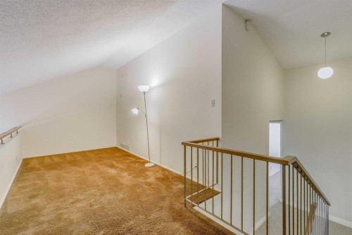 9-2225 Oakmoor Drive Sw, Calgary, AB - Indoor Photo Showing Other Room