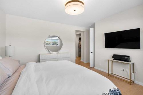 1104 Cranbrook Gardens Se, Calgary, AB - Indoor Photo Showing Bedroom