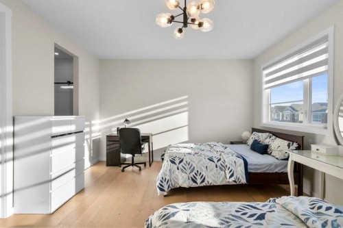 1104 Cranbrook Gardens Se, Calgary, AB - Indoor Photo Showing Bedroom
