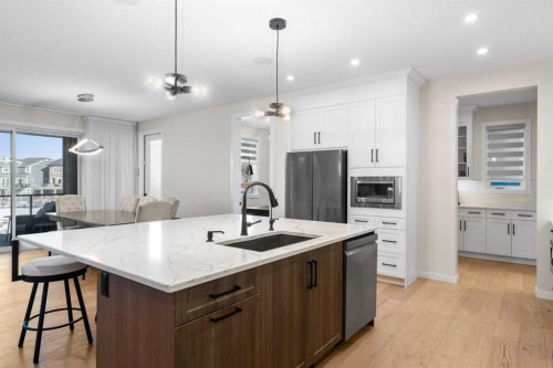 1104 Cranbrook Gardens Se, Calgary, AB - Indoor Photo Showing Kitchen With Upgraded Kitchen