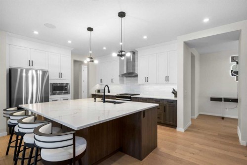 1104 Cranbrook Gardens Se, Calgary, AB - Indoor Photo Showing Kitchen With Upgraded Kitchen
