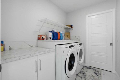 123 Howse Hill Ne, Calgary, AB - Indoor Photo Showing Laundry Room