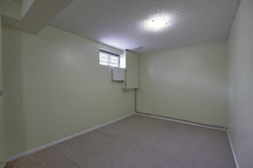 164 Faldale Close Ne, Calgary, AB - Indoor Photo Showing Other Room