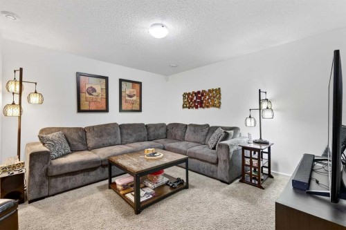 222 Walden Gate Se, Calgary, AB - Indoor Photo Showing Living Room