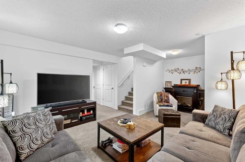 222 Walden Gate Se, Calgary, AB - Indoor Photo Showing Living Room