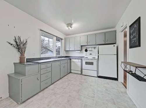 56 Glenpatrick Drive Sw, Calgary, AB - Indoor Photo Showing Kitchen
