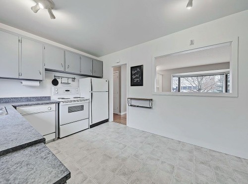 56 Glenpatrick Drive Sw, Calgary, AB - Indoor Photo Showing Kitchen