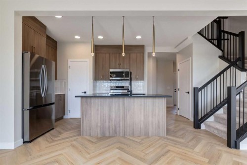 86 Agate Road, Cochrane, AB - Indoor Photo Showing Kitchen