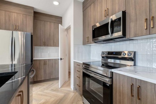 86 Agate Road, Cochrane, AB - Indoor Photo Showing Kitchen