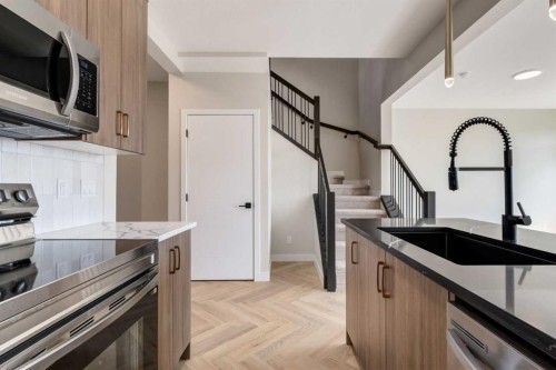 86 Agate Road, Cochrane, AB - Indoor Photo Showing Kitchen
