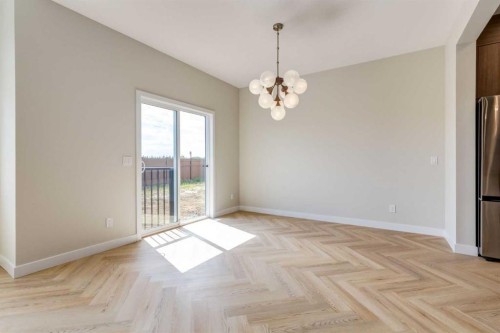 86 Agate Road, Cochrane, AB - Indoor Photo Showing Other Room