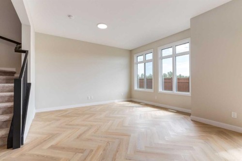 86 Agate Road, Cochrane, AB - Indoor Photo Showing Other Room