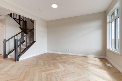 86 Agate Road, Cochrane, AB - Indoor Photo Showing Other Room