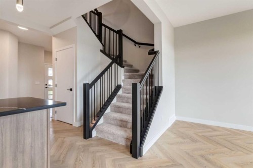 86 Agate Road, Cochrane, AB - Indoor Photo Showing Other Room