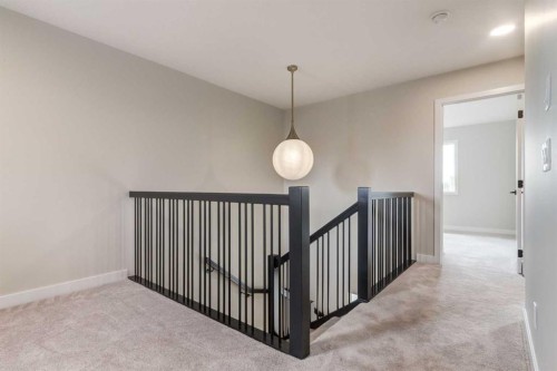 86 Agate Road, Cochrane, AB - Indoor Photo Showing Other Room