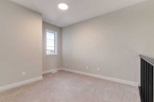 86 Agate Road, Cochrane, AB - Indoor Photo Showing Other Room