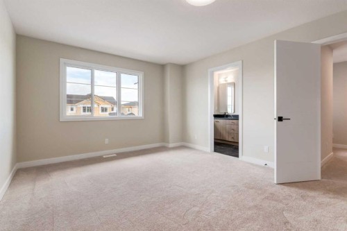 86 Agate Road, Cochrane, AB - Indoor Photo Showing Other Room