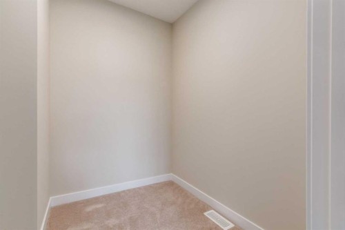 86 Agate Road, Cochrane, AB - Indoor Photo Showing Other Room