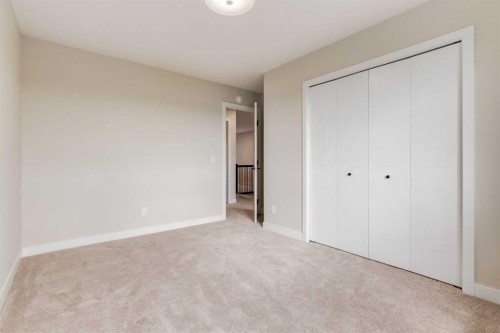 86 Agate Road, Cochrane, AB - Indoor Photo Showing Other Room