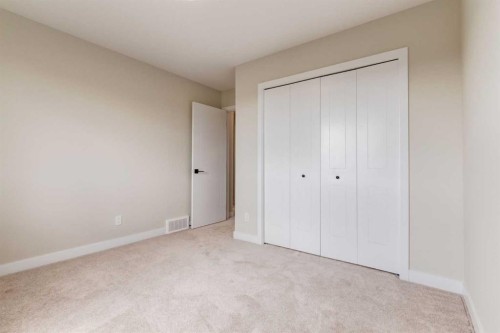 86 Agate Road, Cochrane, AB - Indoor Photo Showing Other Room