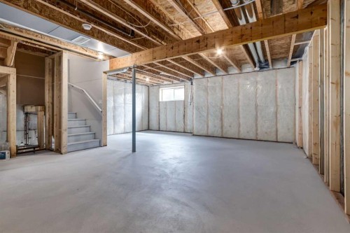 86 Agate Road, Cochrane, AB - Indoor Photo Showing Basement