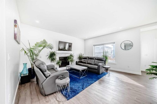 772 Edgefield Crescent, Strathmore, AB - Indoor Photo Showing Living Room With Fireplace