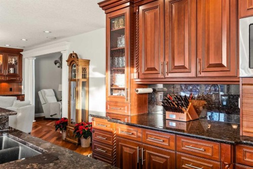 25 Mckinley Bay Se, Calgary, AB - Indoor Photo Showing Kitchen With Double Sink