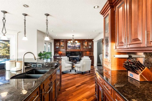25 Mckinley Bay Se, Calgary, AB - Indoor Photo Showing Kitchen With Double Sink With Upgraded Kitchen