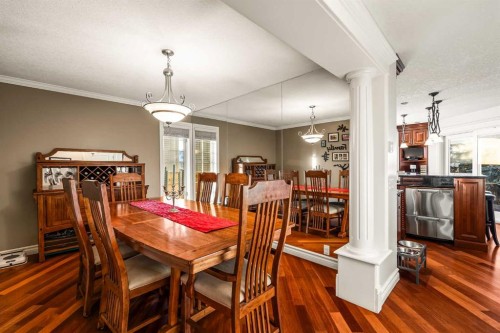 25 Mckinley Bay Se, Calgary, AB - Indoor Photo Showing Dining Room