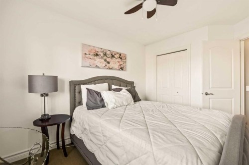 25 Mckinley Bay Se, Calgary, AB - Indoor Photo Showing Bedroom